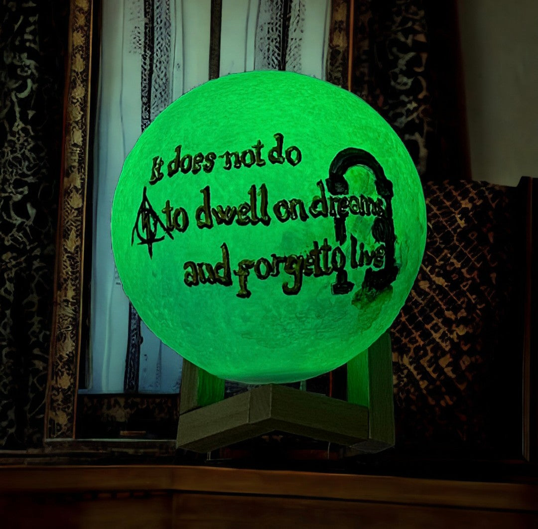 Emerald Blossoms - &quot;It does not do to dwell on dreams and forget to live&quot; hand painted on moon lamp
