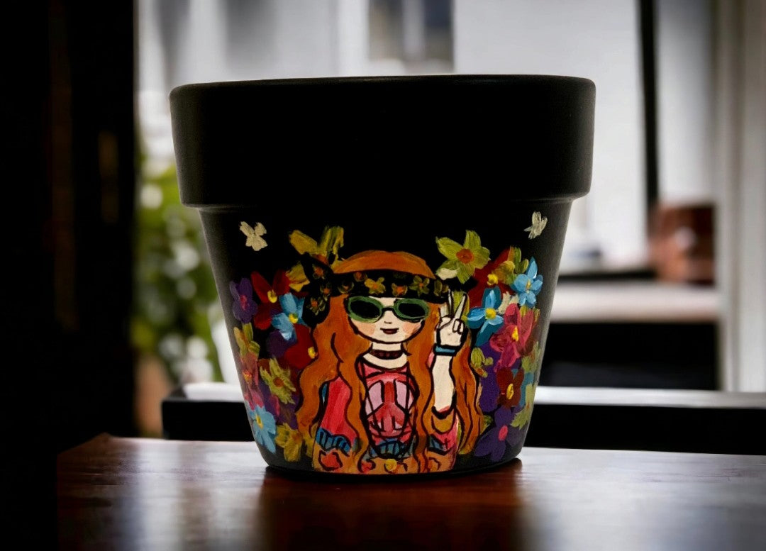 Emerald Blossoms - A cool girl with the hippies’s style combined a striking black and sunflowers background hand-painted on terracotta pots