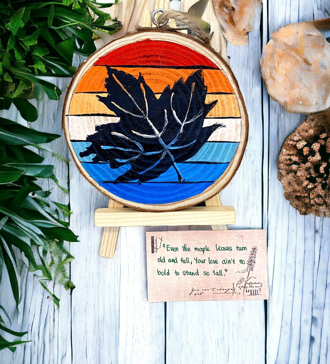 Emerald Blossoms - Canadian maple leaf with retro background painted on a wood slice
