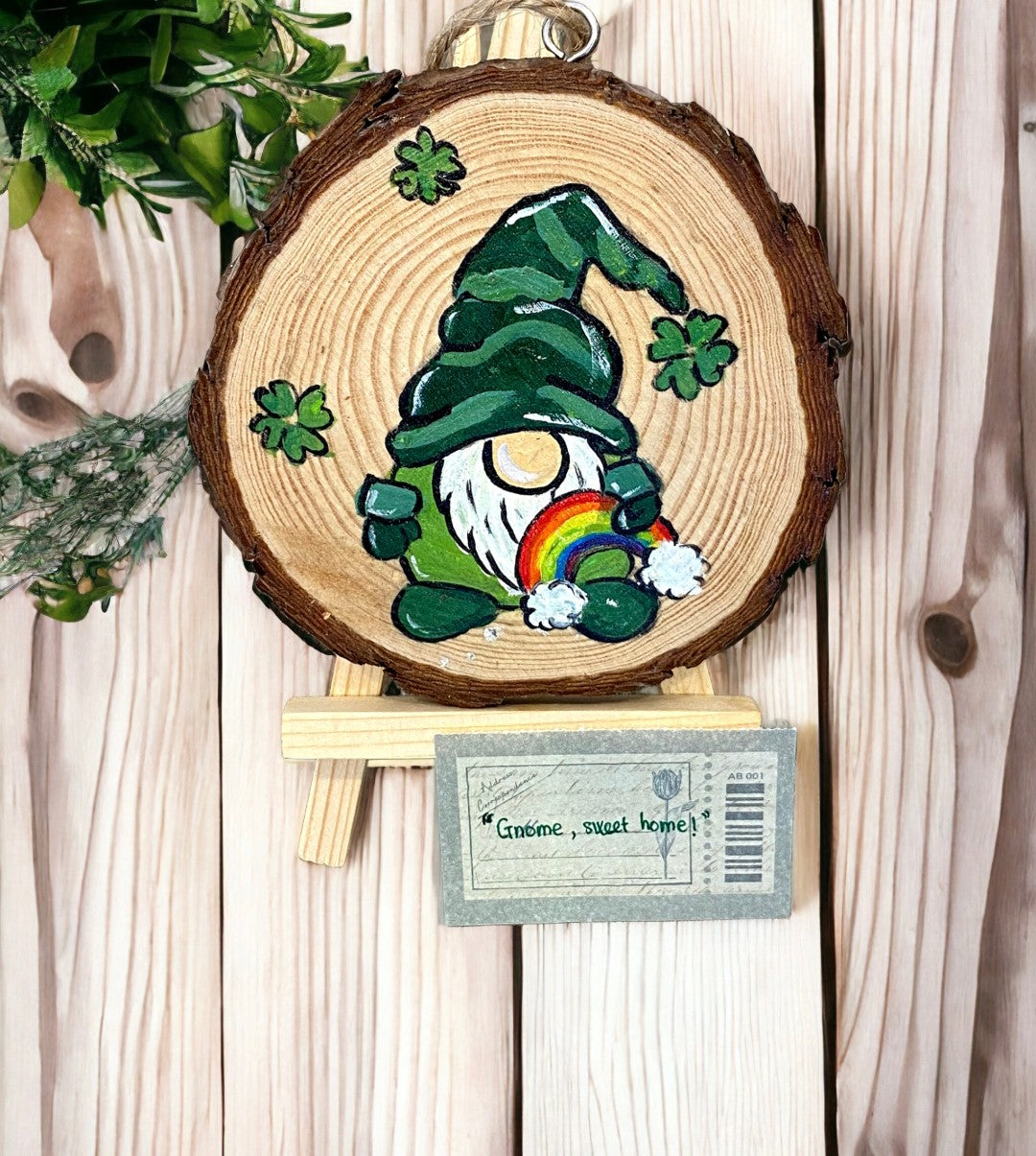Emerald Blossoms - Painted wood slice with a Gnome holding a rainbow