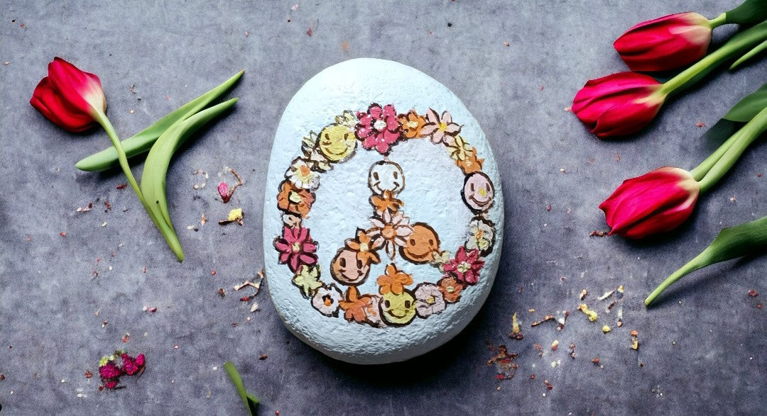 Emerald Blossoms - Peace symbol with sunflowers and cheerful smileys hand painted on rock
