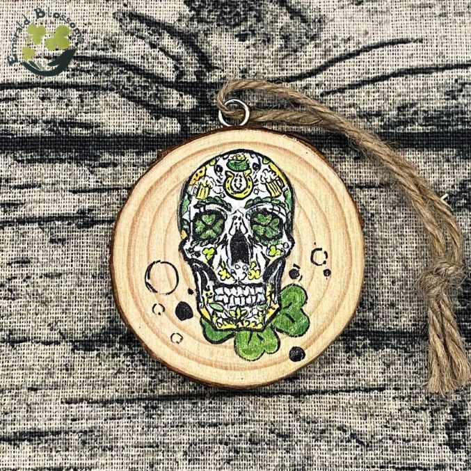 Emerald Blossoms - A hand-painted Sugar Skull with luck shamrock on wood slice